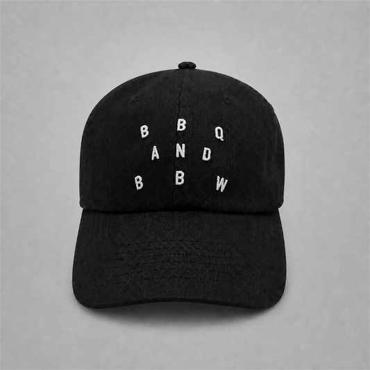 Black BnB embroidered cap on neutral studio gray background
