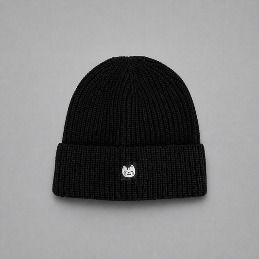 Black KnT Beanie on neutral studio gray background