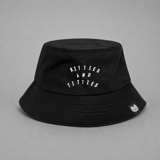 Black KnT Bucket Cap on neutral studio gray background