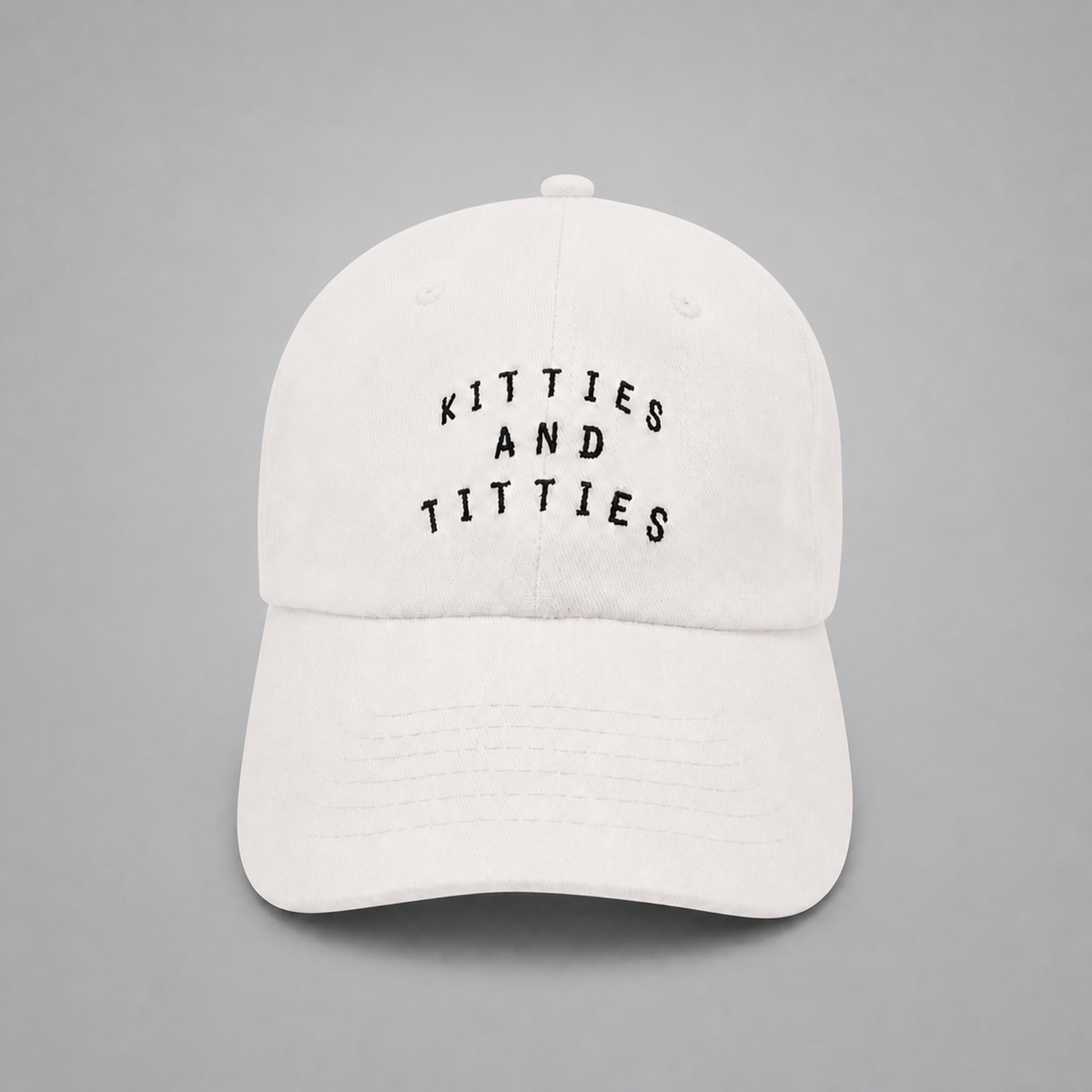 White KnT Cap on neutral studio gray background
