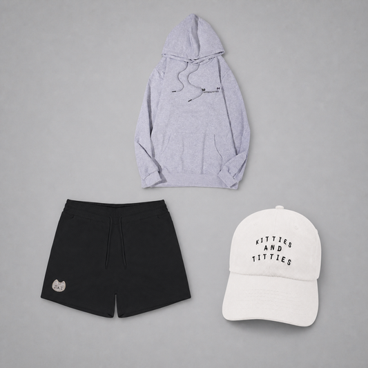 KnT Cap, hoodie, and shorts set on neutral studio gray background