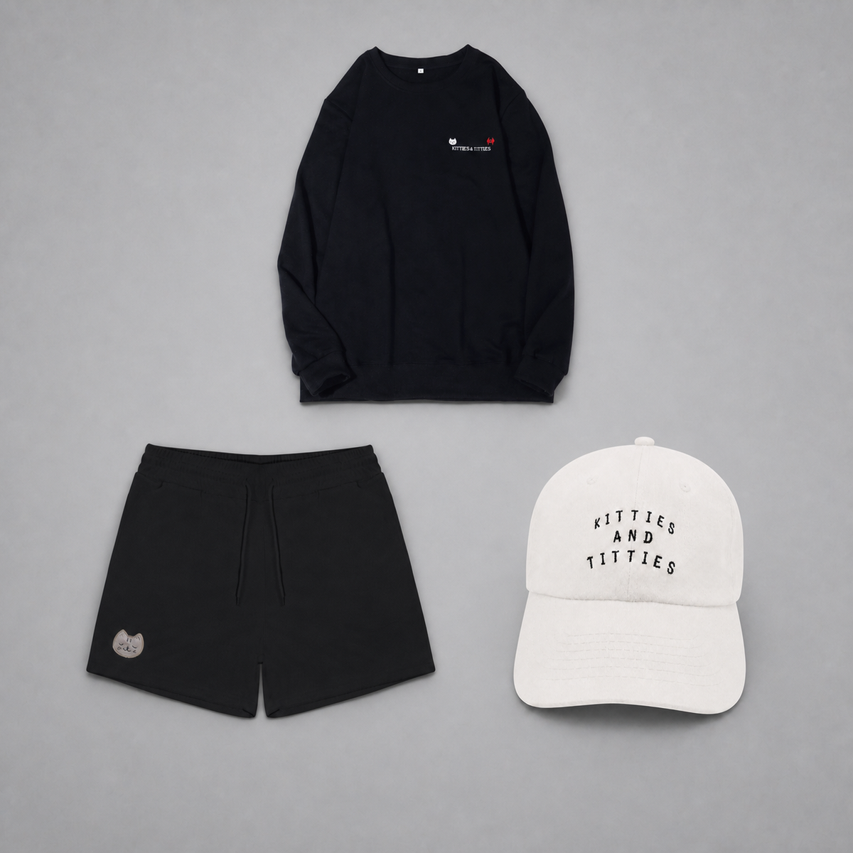 KnT Cap, sweater, and shorts set on neutral studio gray background