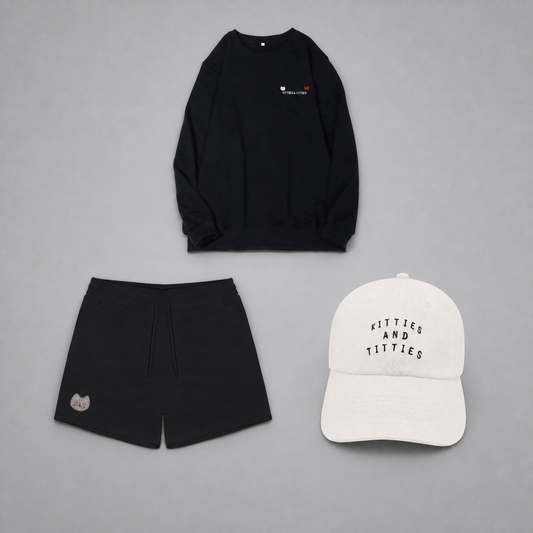 KnT Cap, sweater, and shorts set on neutral studio gray background
