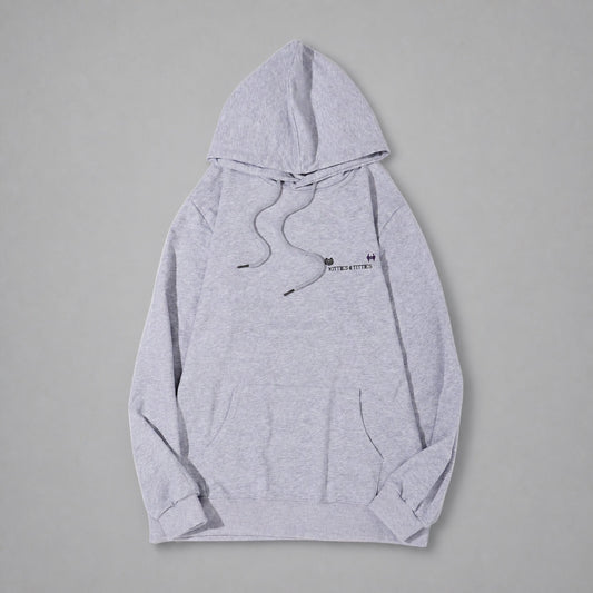 KnT Hoodie on neutral studio gray background