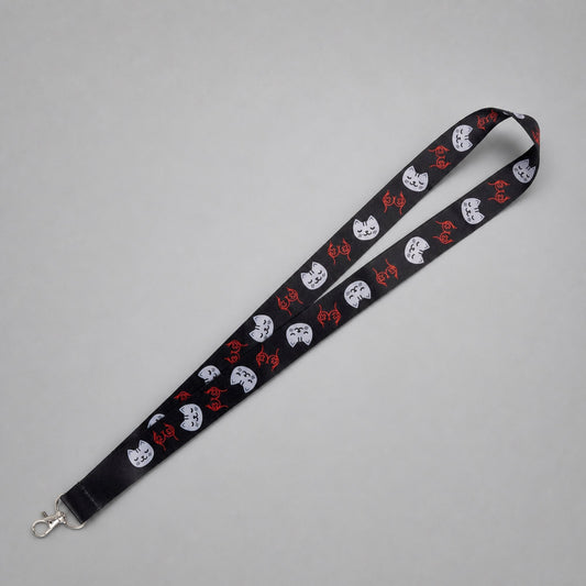 KnT kitty lanyard on neutral studio gray background
