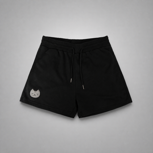 Black KnT Shorts on neutral studio gray background