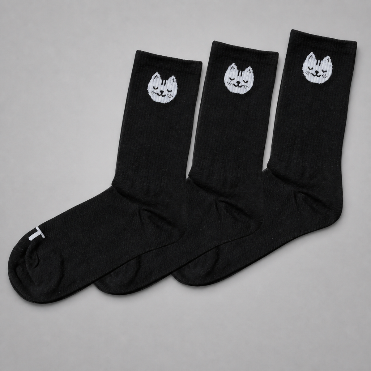 KnT socks set on neutral studio gray background