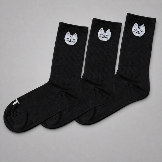 KnT socks set on neutral studio gray background